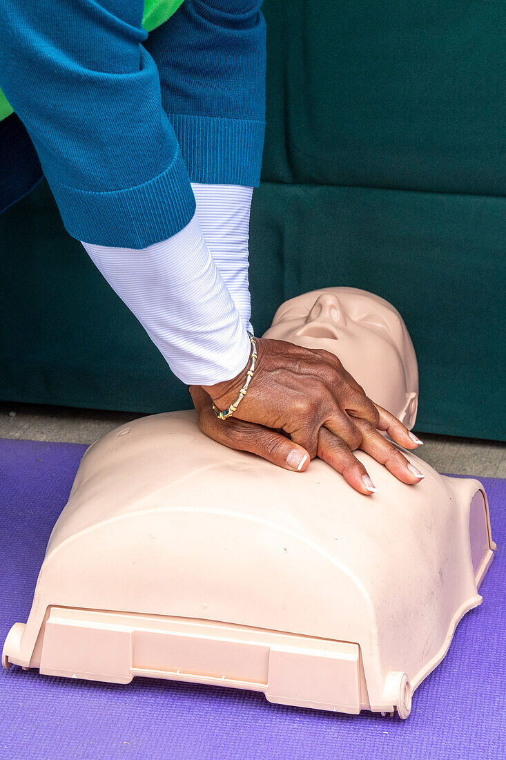 Woman learning CPR