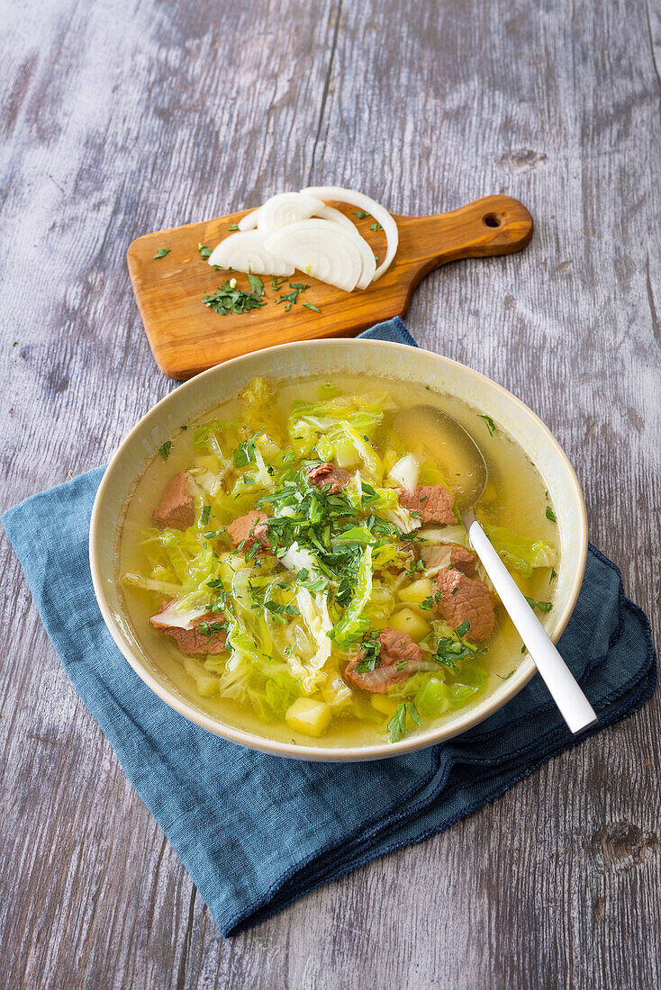 Savoy cabbage stew with beef and potatoes