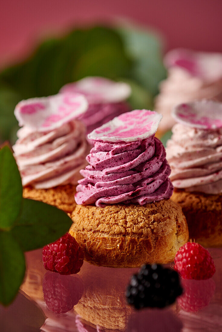 Cream puffs with red berry cream