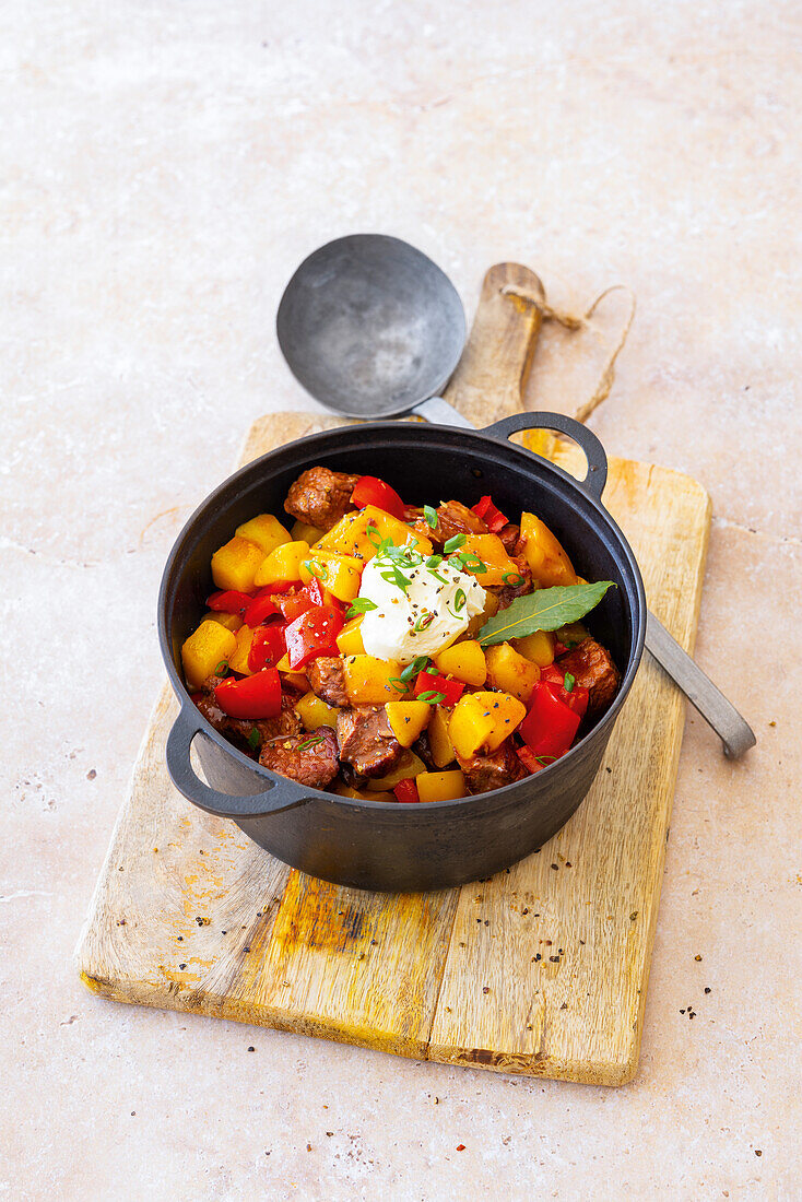 Potato goulash with beef and peppers