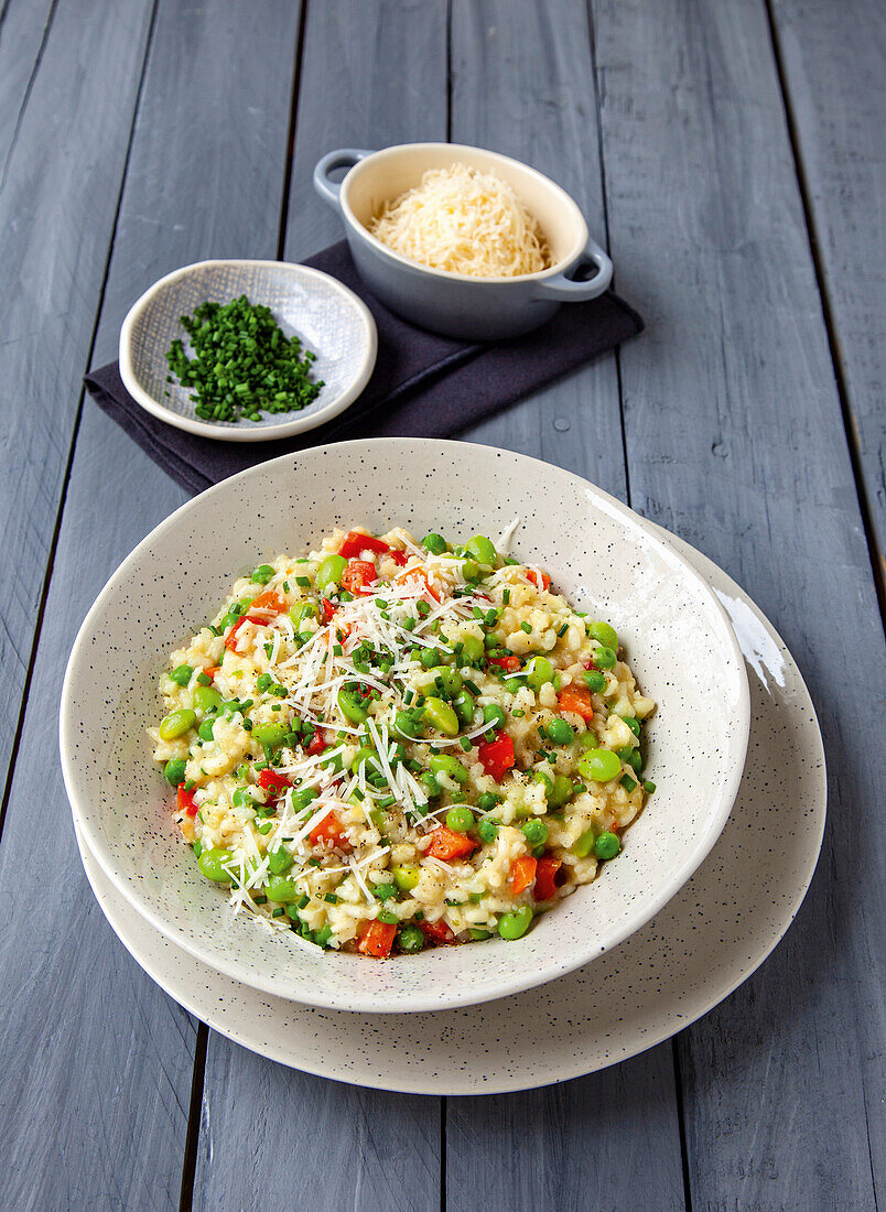 Colourful risotto with peas, edamame and peppers