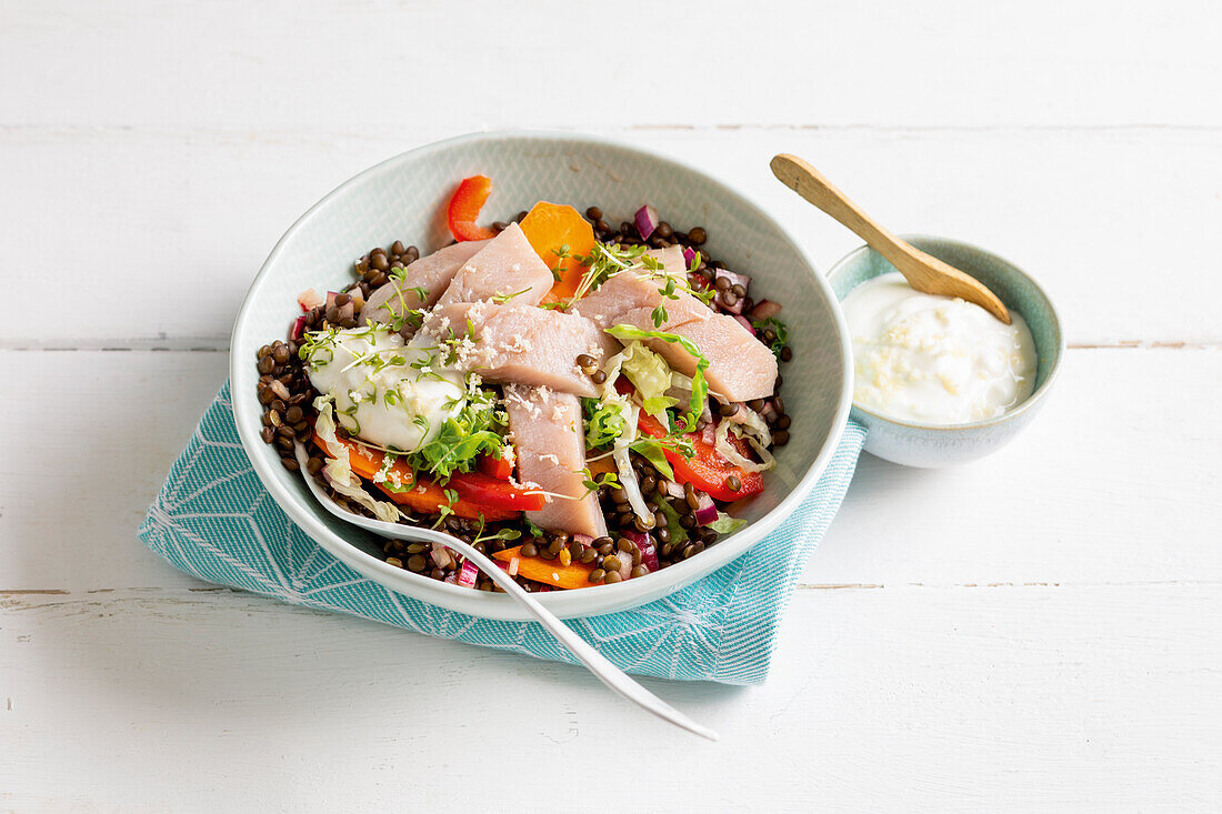 Lentil bowl with matjes and horseradish dip