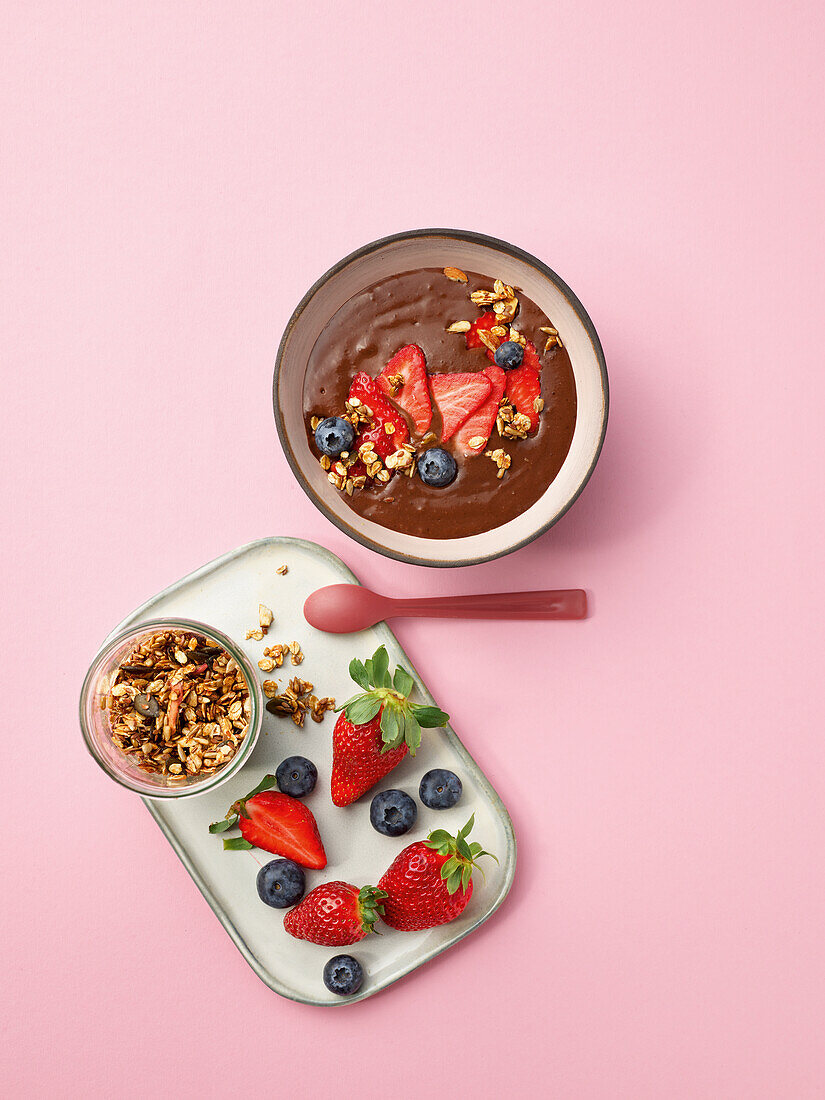 Creamy chocolate smoothie bowl with berries
