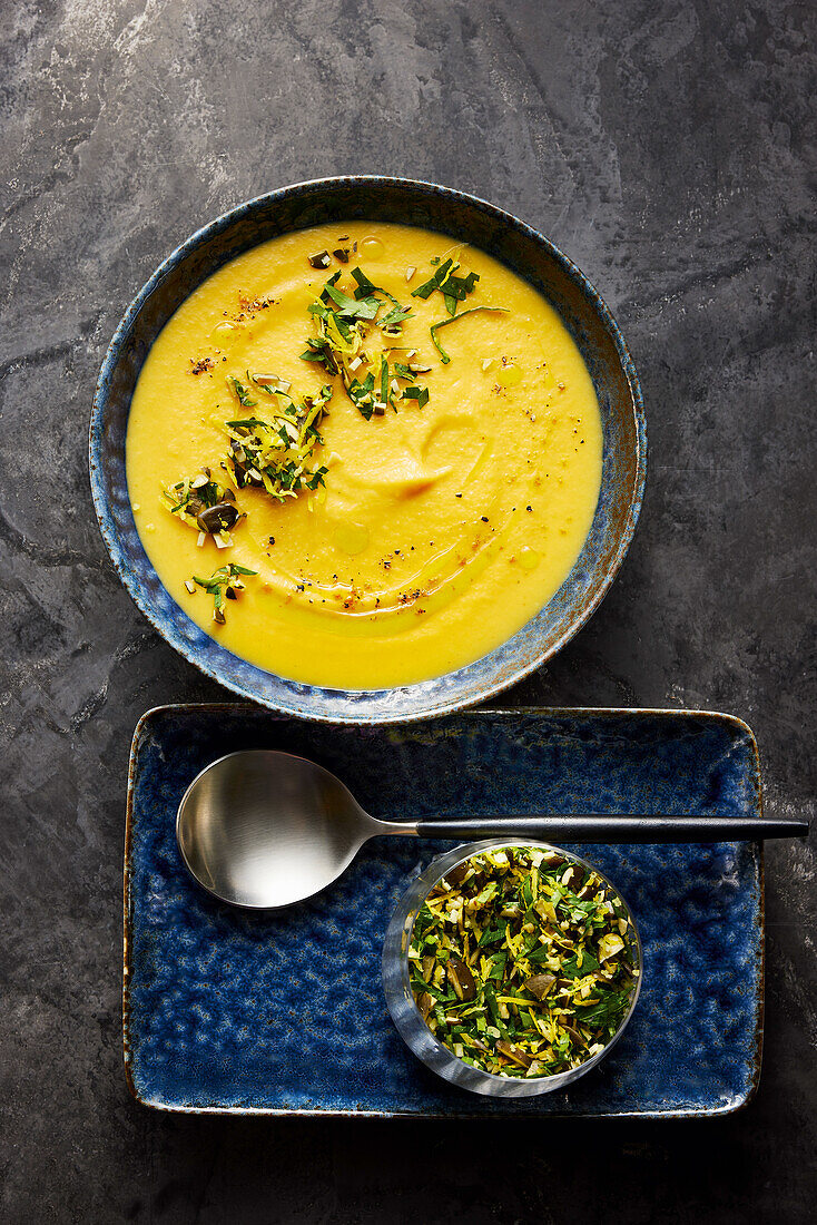 Cream of parsnip soup with pumpkin seed gremolata