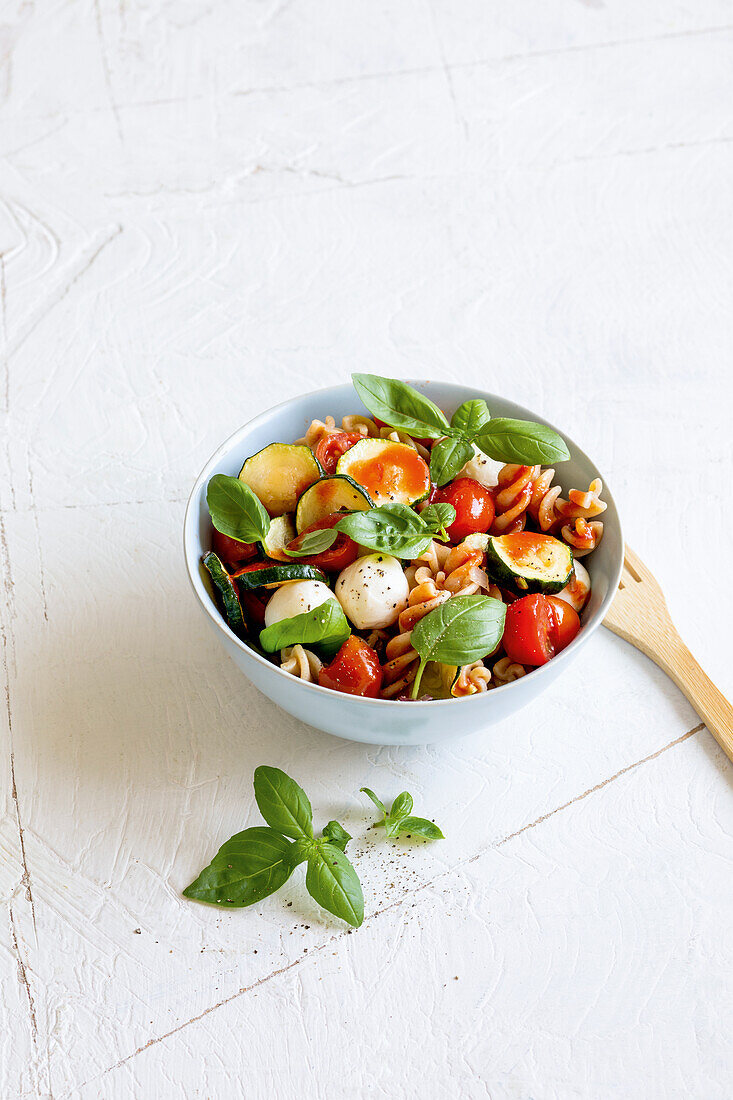 Mediterranean pasta salad with mini mozzarella