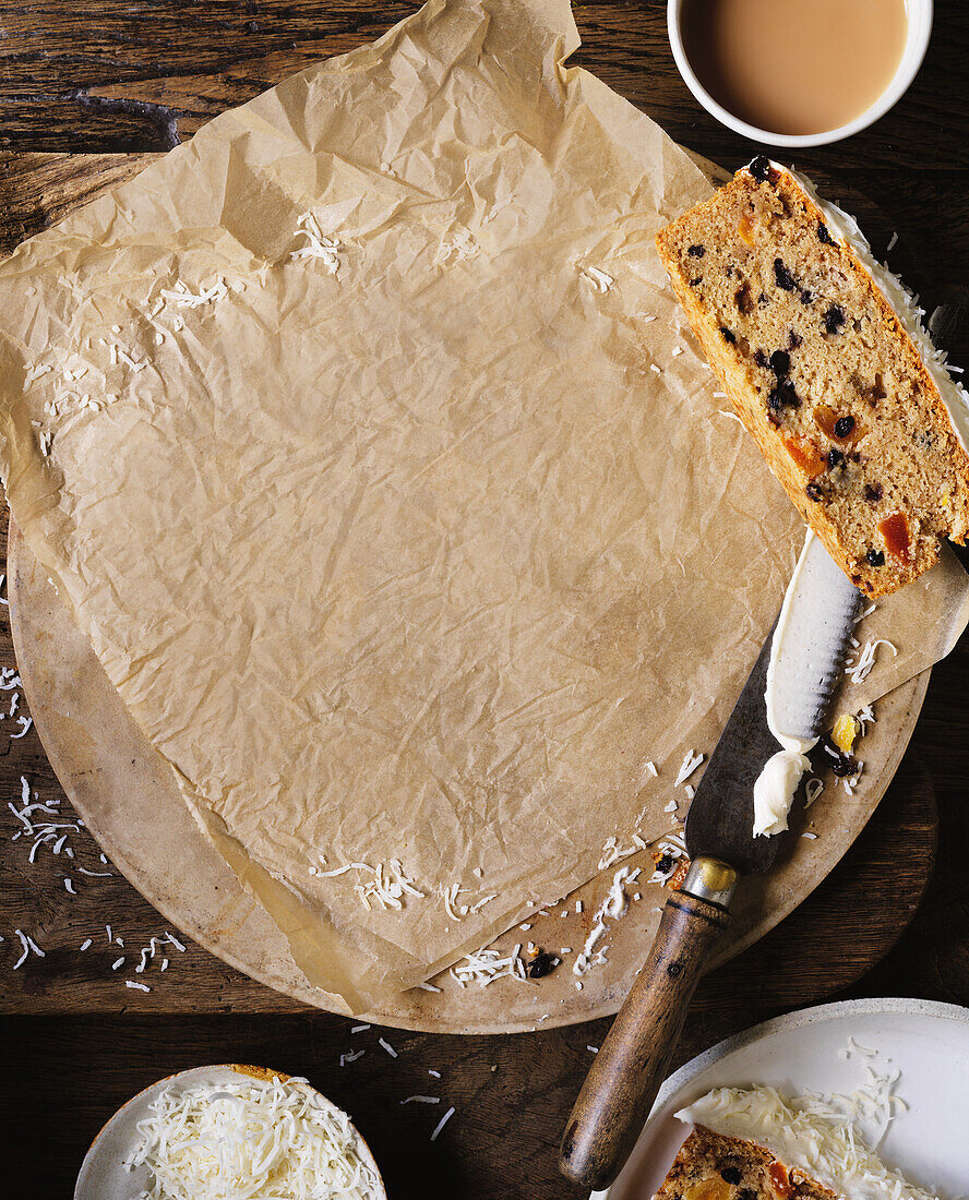 Empty baking paper with leftover piece of Christmas cake