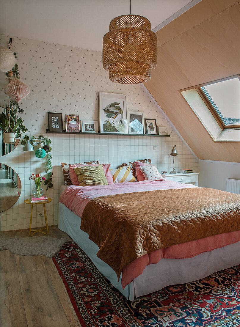 Attic bedroom with Scandinavian design, rug and rattan lamp