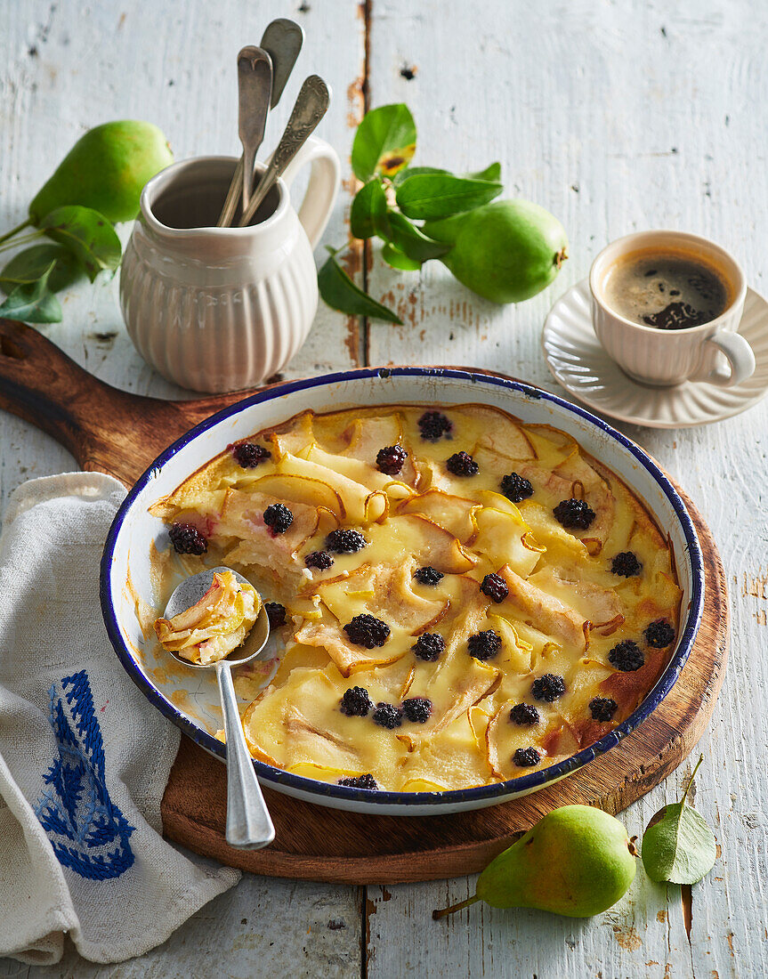 Baked creamy pears with blackberries