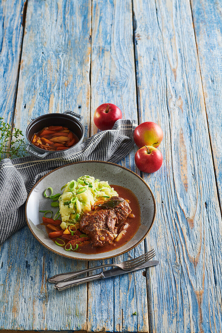 Pork cheeks braised in cider with mashed potatoes