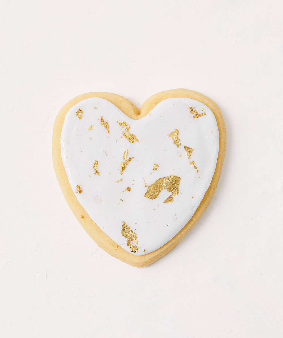Cookie with icing and edible gold leaf