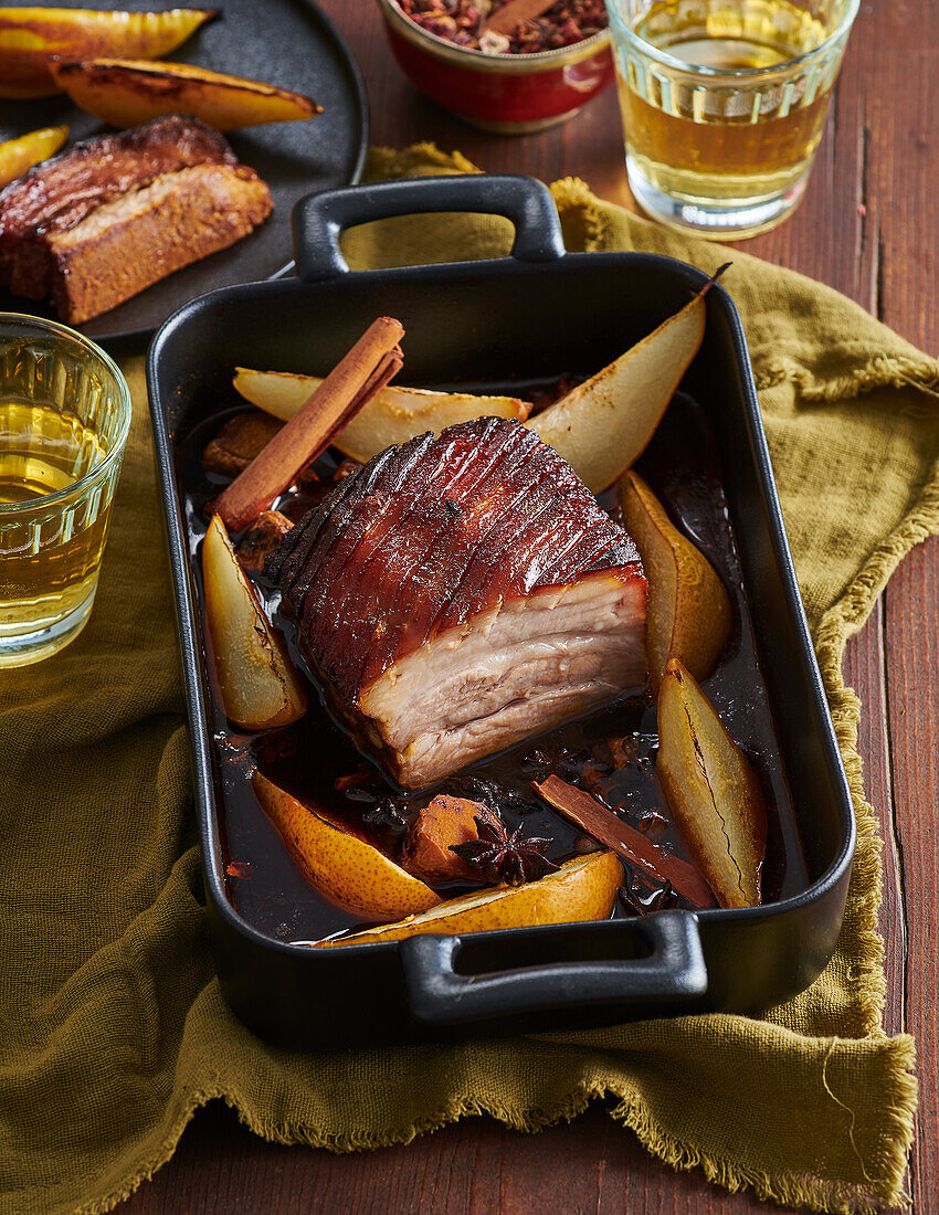 Spicy roast pork belly with pears and star anise