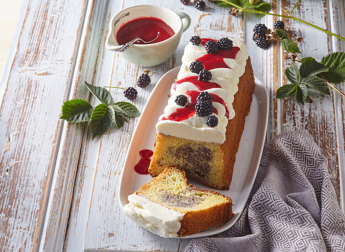 Sweet poppy seed cake with blackberries