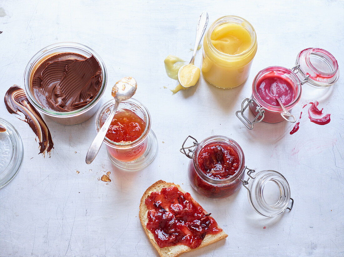 Various sweet spreads in jars