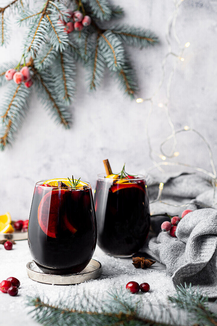 Red mulled wine with cranberries, orange, cinnamon and aniseed