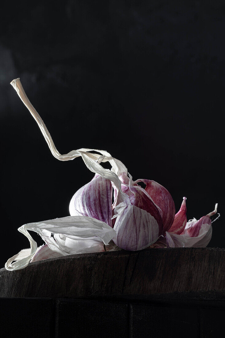 Garlic against a black background