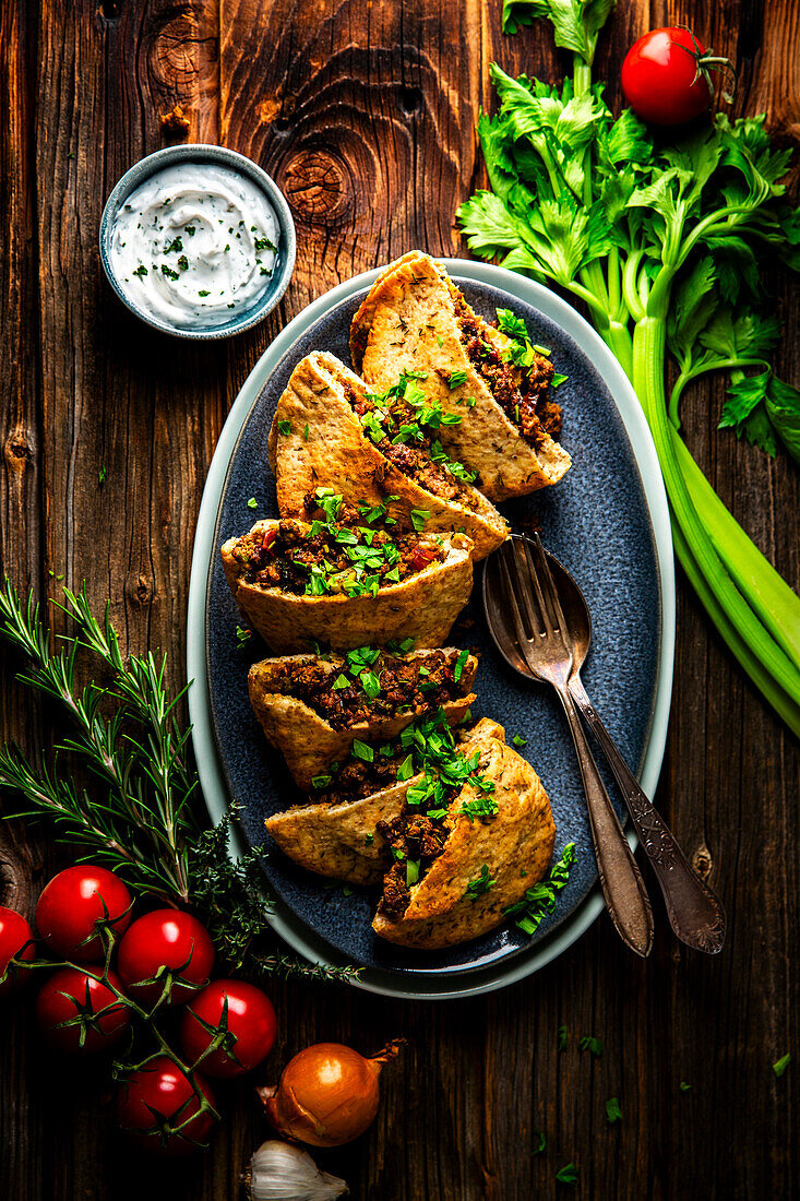 Egyptian hawawshi pita with minced meat and celery