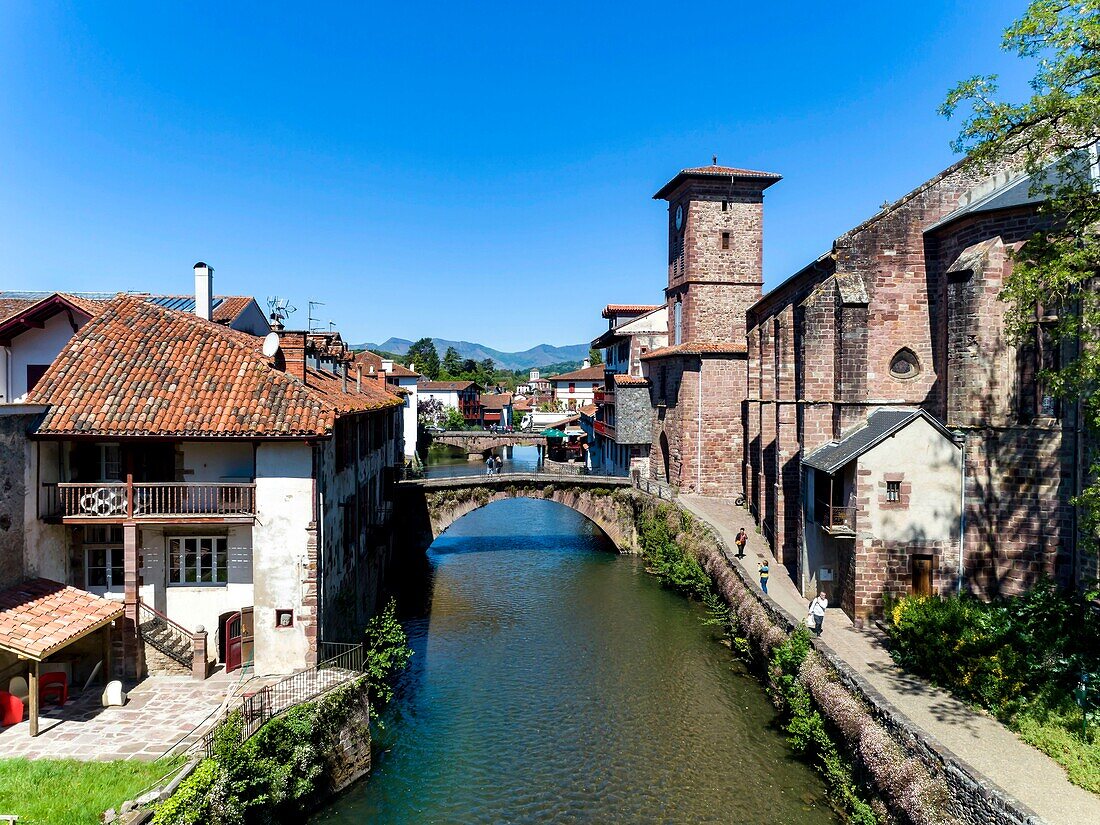 France,Pyrenees Atlantiques,Basque country,Saint Jean Pied de Port,the Old Bridge on the Nive River of Béhérobie and the Church of the Assumption or Notre Dame du Bout du Pont (aerial view)