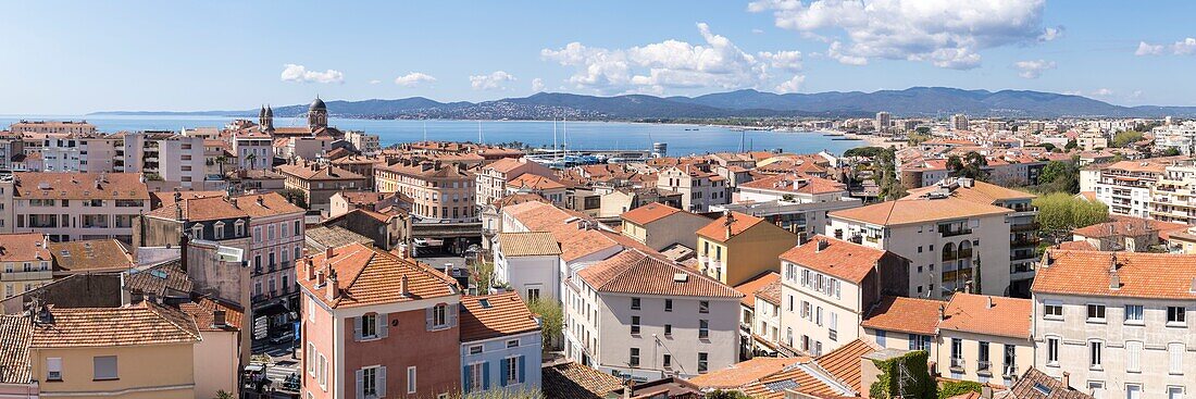 France,Var,Saint-Raphaël,the old center and Notre-Dame de la Victoire basilica,Frejus beach and the Maures massif in the background