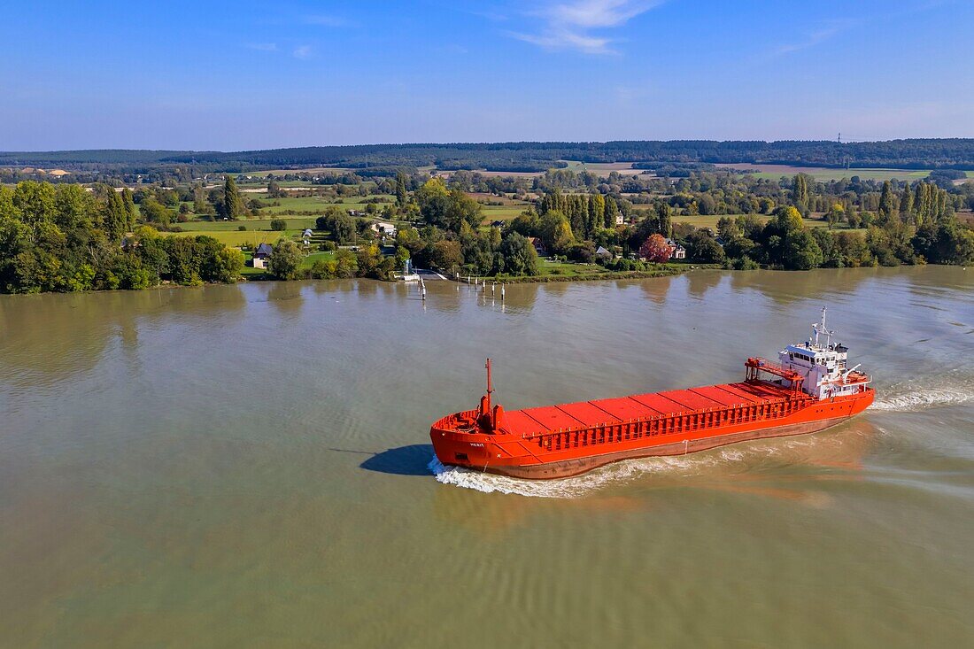 France,Seine-Maritime,Pays de Caux,Norman Seine River Meanders Regional Nature Park,the general cargo ship Merit going up the Seine at Mesnil sous Jumieges (aerial view)