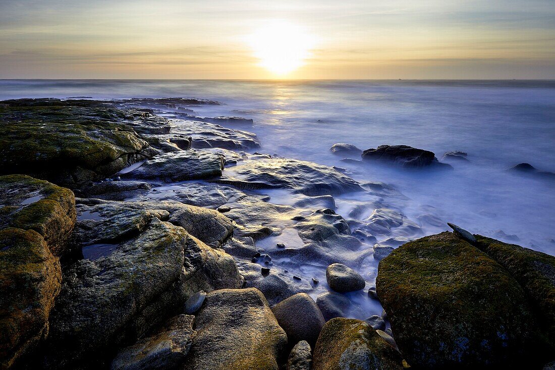 France,Finistere,Iroise Sea,Iles du Ponant,Parc Naturel Regional d'Armorique (Armorica Regional Natural Park),Ile de Sein,labelled Les Plus Beaux de France (The Most Beautiful Village of France),coucher de soleil sur les rochers à l'ouest de l'île