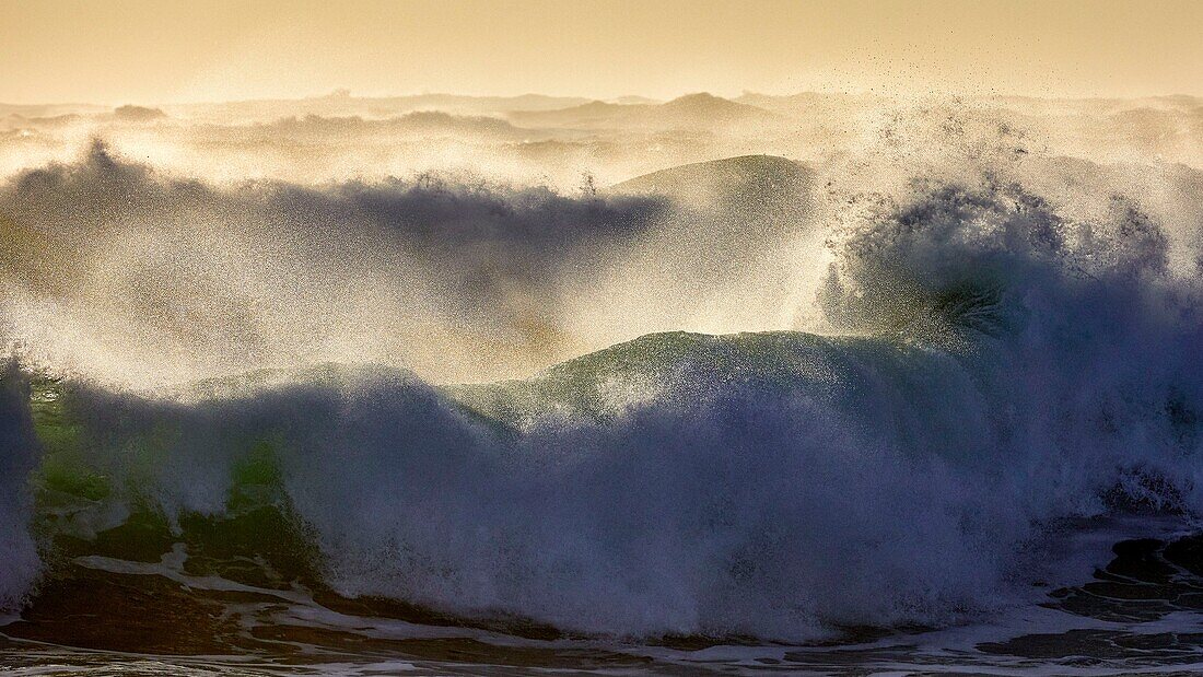 France,Finistere,Iroise Sea,Iles du Ponant,Parc Naturel Regional d'Armorique (Armorica Regional Natural Park),Ile de Sein,labelled Les Plus Beaux de France (The Most Beautiful Village of France),wave on the chaussée de Sein in the west of the island