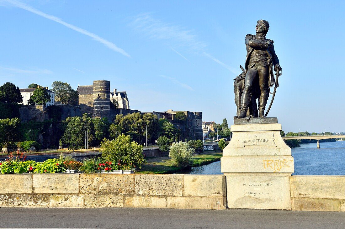 France,Maine et Loire,Angers,Beaurepaire statue on Verdun bridge over the Maine river and the castle of the Dukes of Anjou