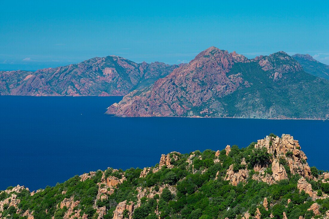 France,Corse du Sud,Gulf of Porto,listed as World Heritage by UNESCO,Piana shores with pink granite rocks,Capo Senino and the Scandola peninsula Nature Reserve in the background