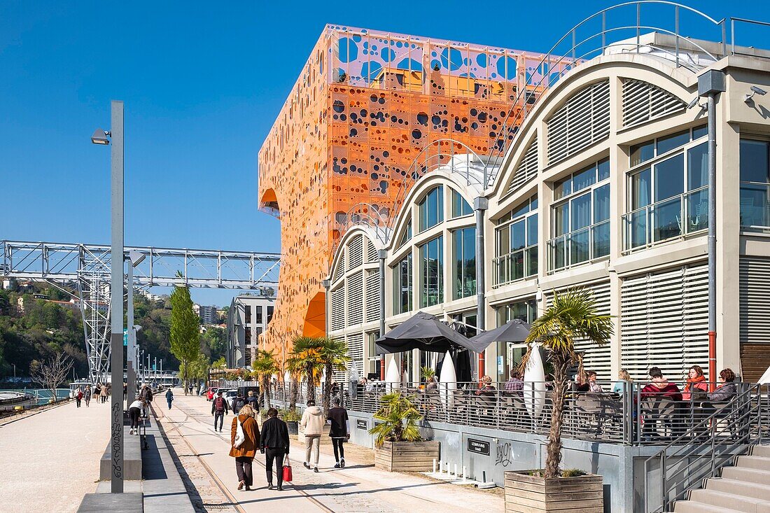 France,Rhone,Lyon,La Confluence district south of the Presqu'ile,close to the confluence of the Rhone and the Saone rivers,quai Rambaud along the former docks,Selcius restaurant and Pavillon des Salins also called Cube Orange by the architects Dominique Jakob and Brendan Mac Farlane