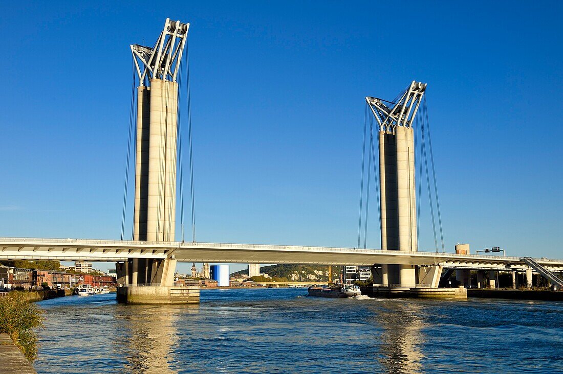 France,Seine Maritime,Rouen,barge passing under the Gustave Flaubert lift bridge over the Seine river