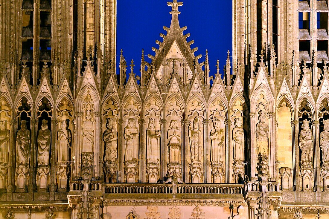 France,Marne,Reims,Notre Dame de Reims cathedral,listed as World Heritage by UNESCO,the western façade,Baptism of Clovis (center) by the Bishop Saint Remi,in the presence of Clotilde,his wife and inspiration of his conversion,the Bishop assistants and of the hermit Montan