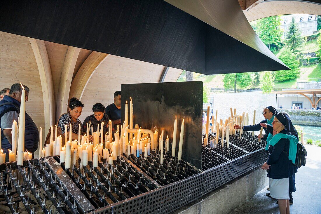 France,Hautes Pyrenees,Lourdes,Sanctuary of Our Lady of Lourdes,candle roaster