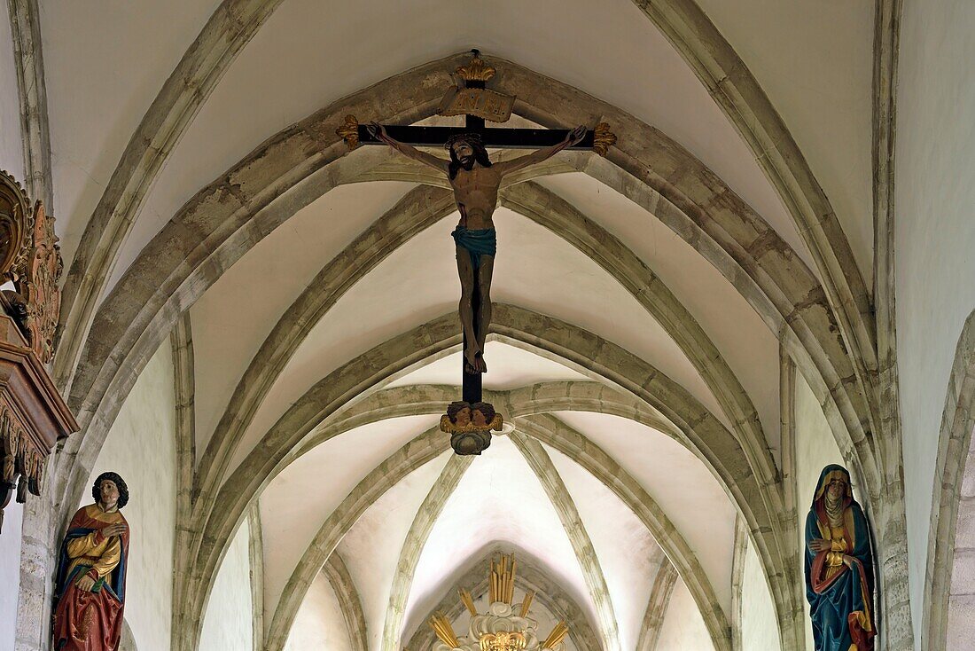 France,Doubs,Mouthier Haute Pierre,Saint Laurent church dated 15th century,entrance of the choir,statue dated 15th century,Christ on the cross,The Virgin,Saint Jean,formed the ordeal of the old beam of Glory