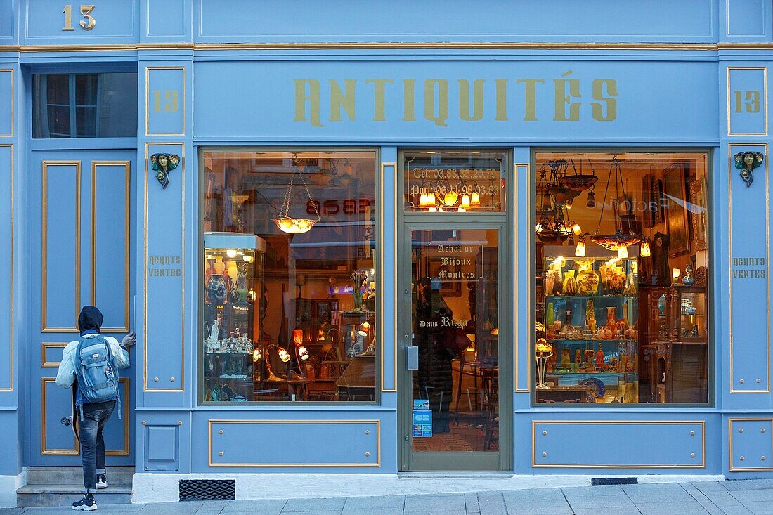 France,Meurthe et Moselle,Nancy,front window of an antic shop on Stanislas street nearby Stanislas square in the area listed as World Heritage by UNESCO
