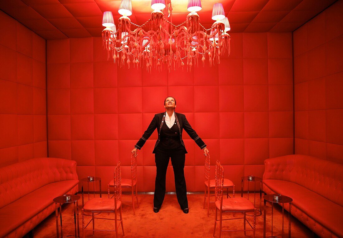France,Paris,Royal Monceau hotel,Julie Eugene,art concierge of the Royal Monceau,in the red smokehouse of the hotel designed by Philippe Starck