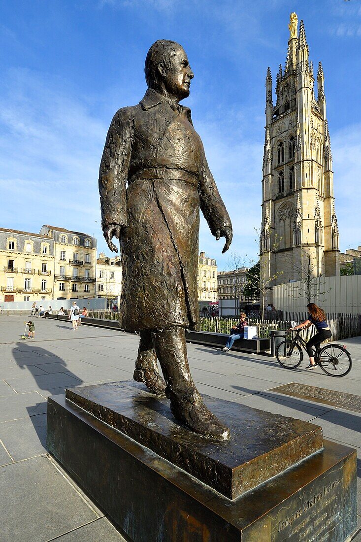 France,Gironde,Bordeaux,area listed as World Heritage by UNESCO,district of the Town Hall,Pey Berland Square,statue representing Jacques Chaban-Delmas by Jean Cardot and the tower Pey Berland,the bell tower of the Saint Andre cathedral