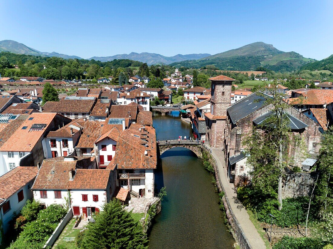 France,Pyrenees Atlantiques,Basque Country,Saint Jean Pied de Port,the Old Bridge on the Nive River of Béhérobie and the Church of the Assumption or Notre Dame du Bout du Pont (aerial view)