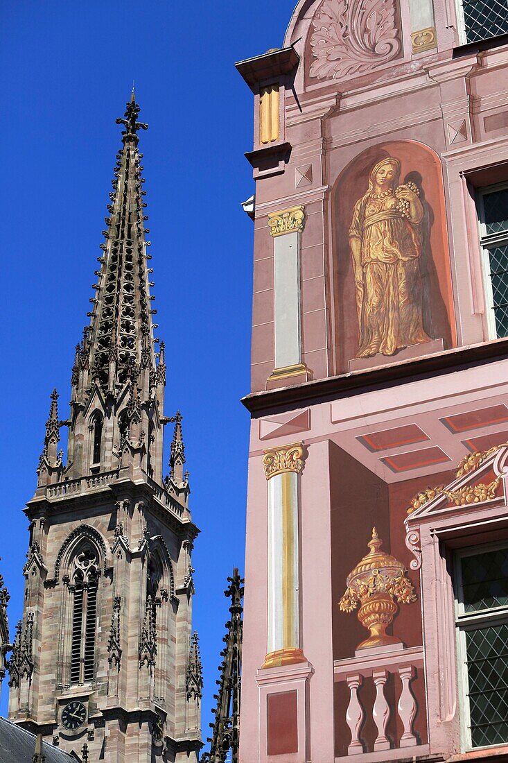 France,Haut Rhin,Mulhouse,Place de la Reunion,Detail of the facade of the town hall and the tower of the temple st Etienne in the background