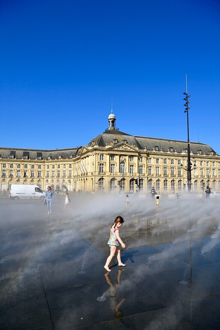 France,Gironde,Bordeaux,area listed as World Heritage by UNESCO,Saint Pierre district,Place de la Bourse,the reflecting pool from 2006 and directed by Jean-Max Llorca hydrant