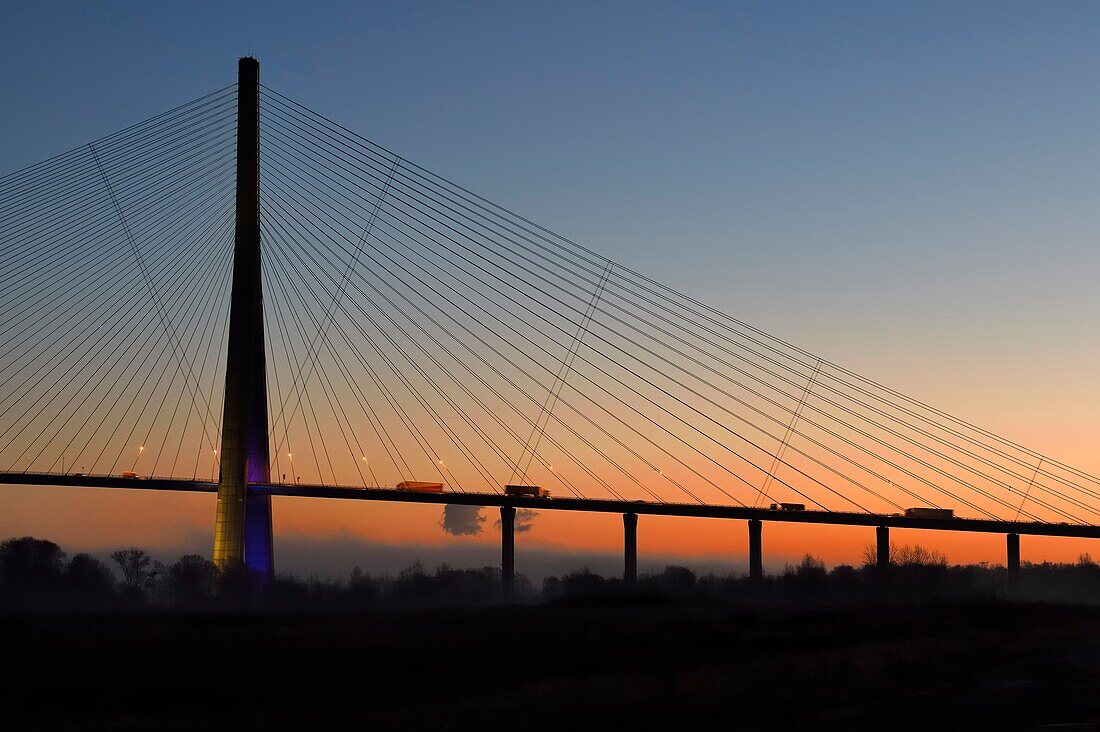 France,between Calvados and Seine Maritime,the Pont de Normandie (Normandy Bridge) at dawn,it spans the Seine to connect the towns of Honfleur and Le Havre