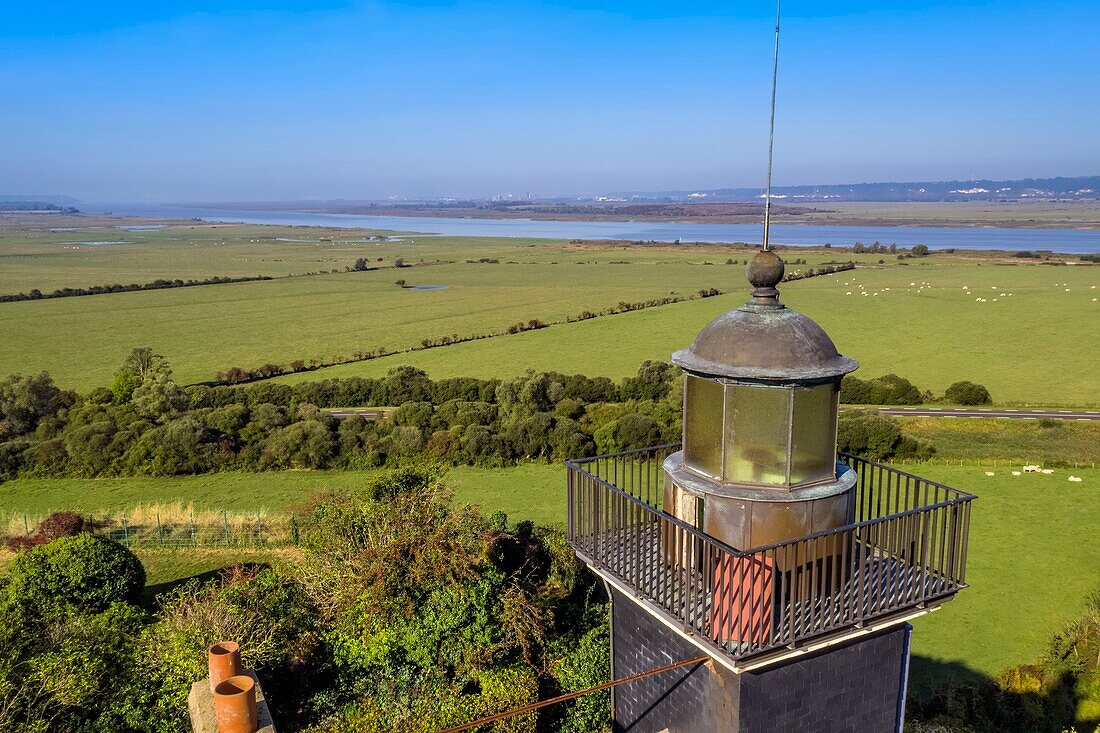 France,Eure,Marais Vernier region,Natural Reserve of the Seine estuary,Saint Samson de la Roque,Roque lighthouse on Pointe de la Roque overlooks the Seine river estuary,the Normandy bridge far in the background (aerial view)