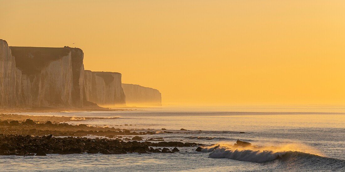 France,Somme,Picardy Coast,Ault,twilight at the foot of the cliffs that stretch towards Le Tréport and Normandy