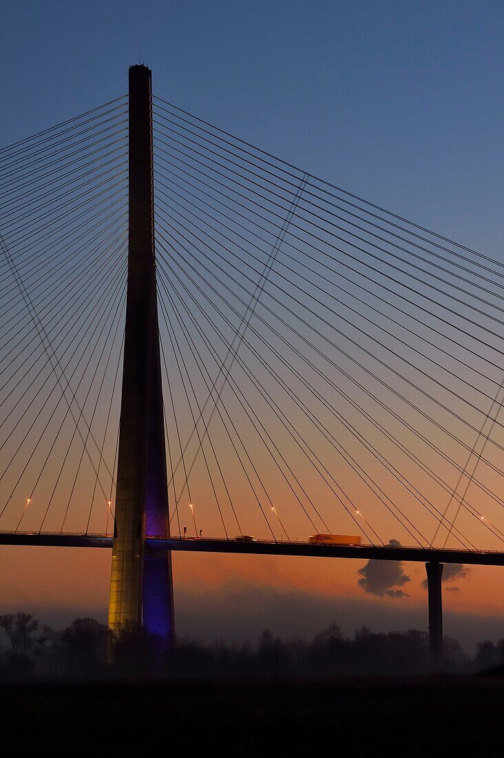 France,between Calvados and Seine Maritime,the Pont de Normandie (Normandy Bridge) at dawn,it spans the Seine to connect the towns of Honfleur and Le Havre