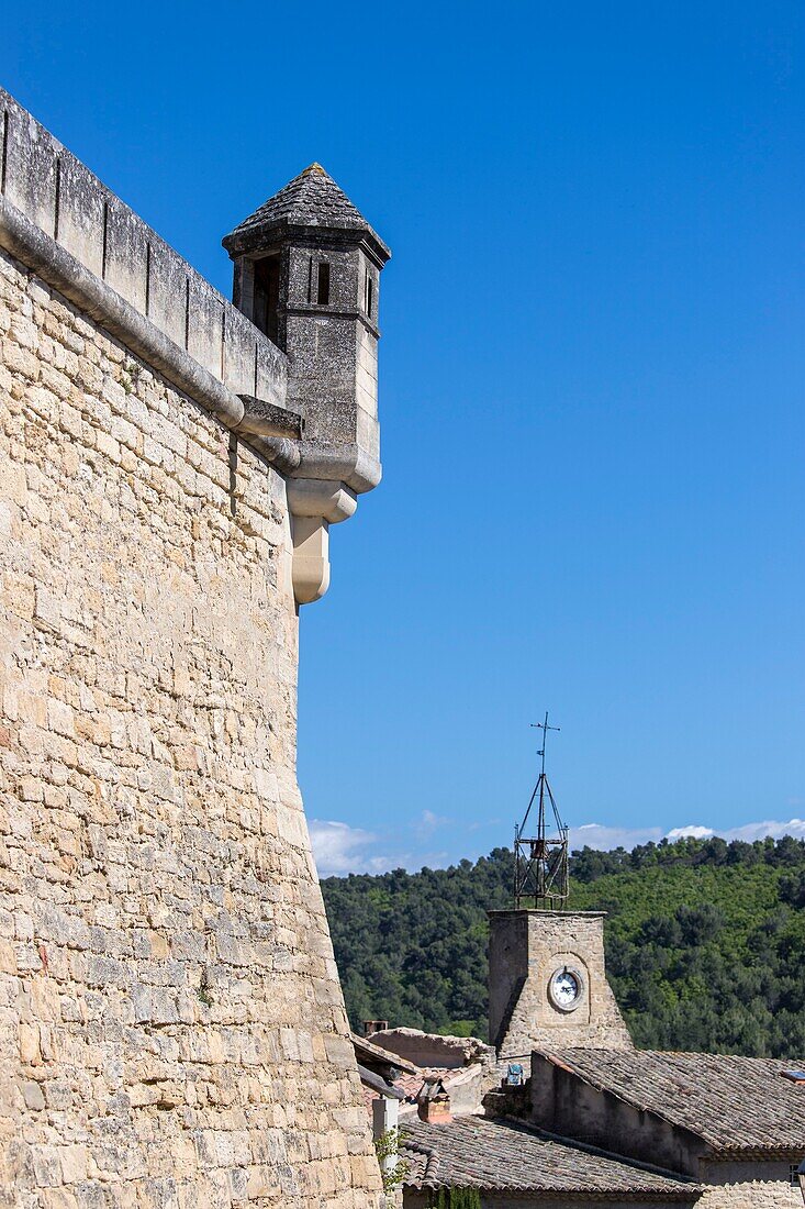 France,Vaucluse,Regional Natural Park of Luberon,Ansouis,labeled the Most beautiful Villages of France,bartizan and ramparts of the castle of the seventeenth century,in the background the Belfry crowned with a wrought iron campanile