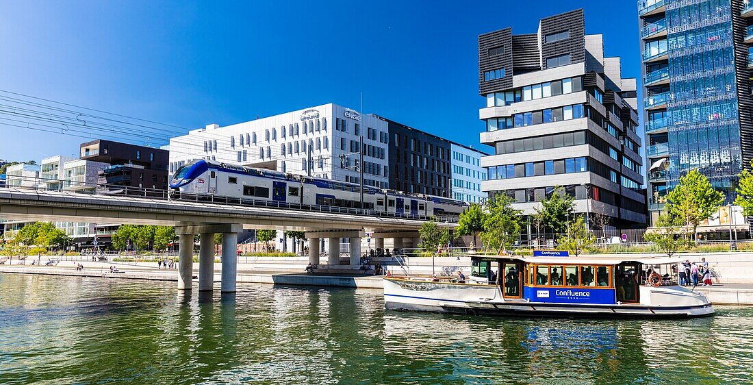 France,Rhone,Lyon,district of La Confluence in the south of the peninsula,first French quarter certified sustainable by the WWF,view on the railway and the Vaporetto