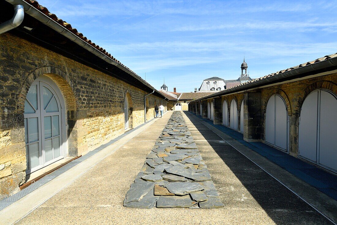 France,Gironde,Bordeaux,area listed as World Heritage by UNESCO,Chartrons district,Centre for contemporary visual arts de Bordeaux (CAPC) in the former warehouse Laine 19th century and inaugurated in 1983,installation (1985) of Richard Long entitled Line of slate