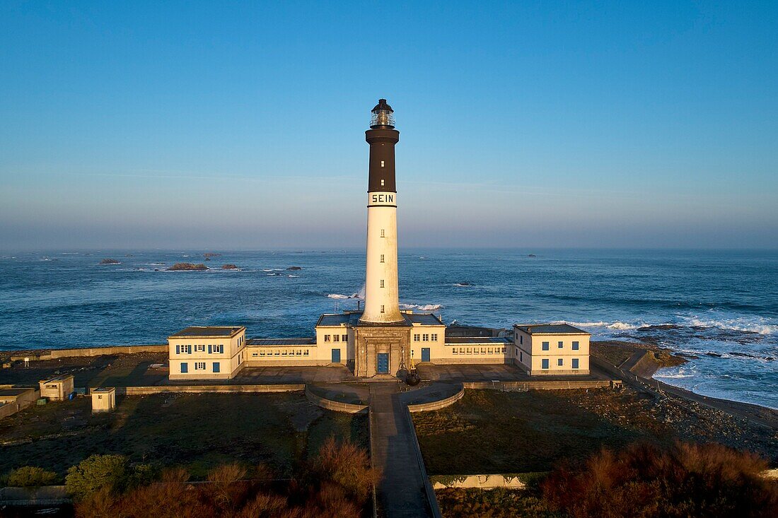 France,Finistere,Iroise Sea,Iles du Ponant,Parc Naturel Regional d'Armorique (Armorica Regional Natural Park),Ile de Sein,labelled Les Plus Beaux de France (The Most Beautiful Village of France,the Sein Lighthouse (Goulenez lighthouse) (aerial view)