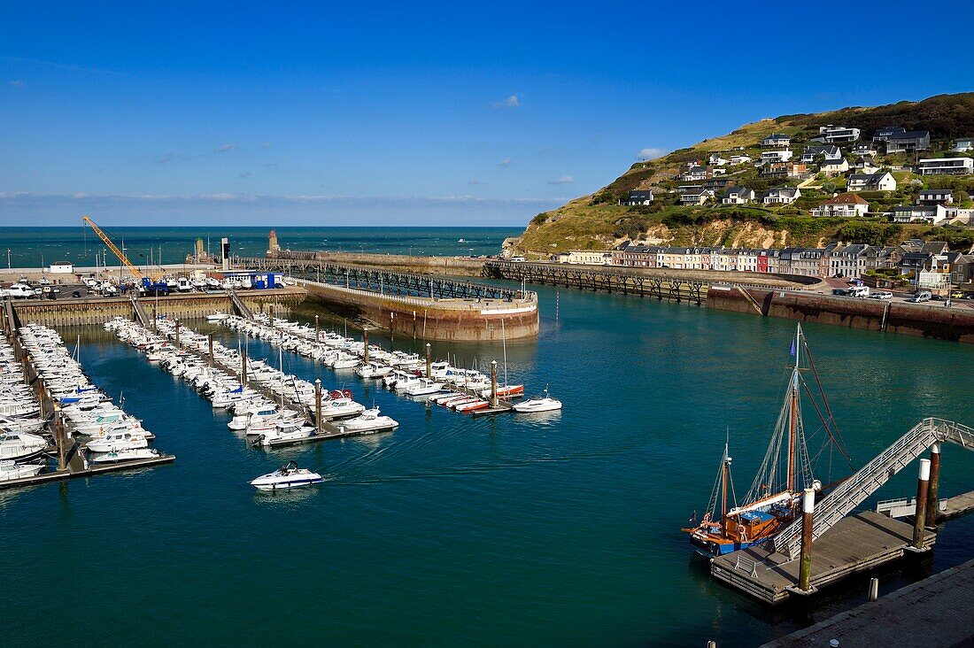 France,Seine Maritime,Pays de Caux,Cote d'Albatre,Fecamp,the old sailing ship Tante Fine docked in the harbor and the Cap Fagnet in the background