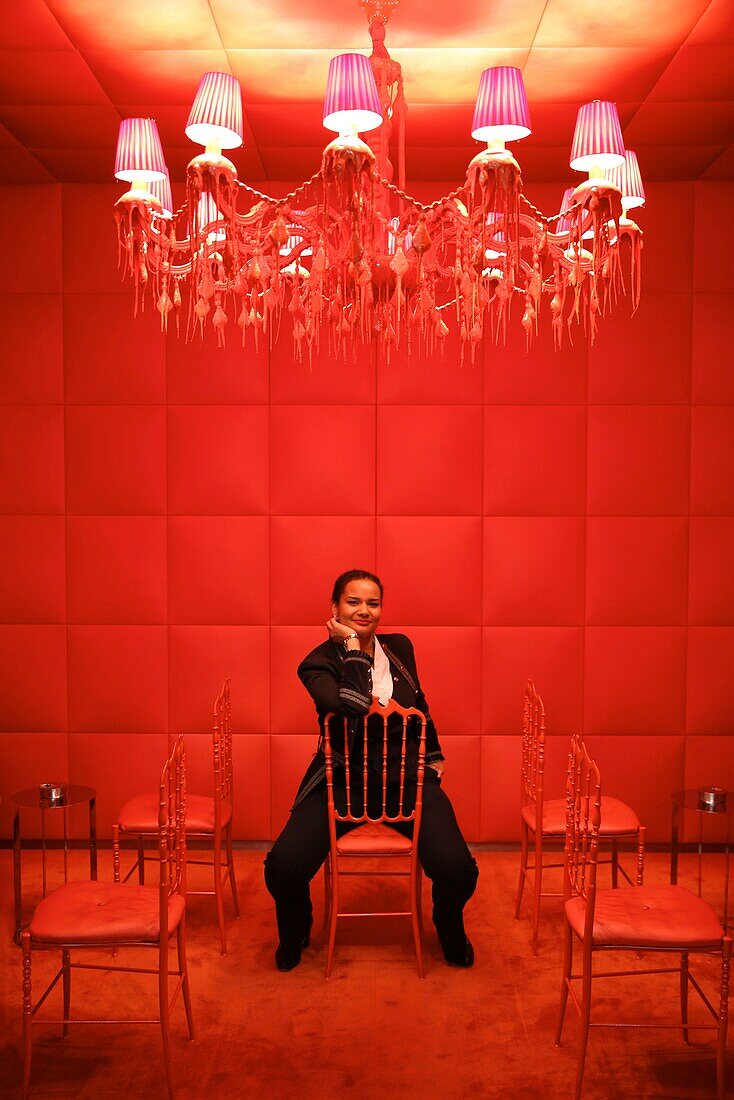 France,Paris,Royal Monceau hotel,Julie Eugene,art concierge of the Royal Monceau,in the red smokehouse of the hotel designed by Philippe Starck