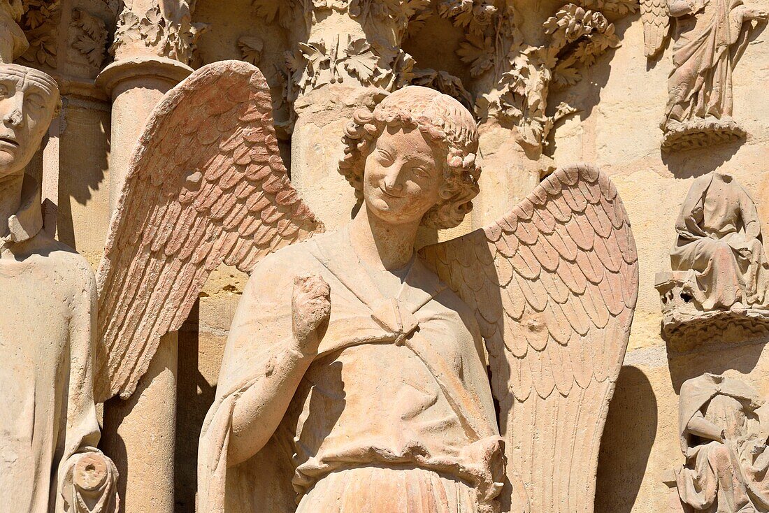 France,Marne,Reims,Notre Dame cathedral,angel with a smile carved between 1236 and 1245 and located at the north left portal