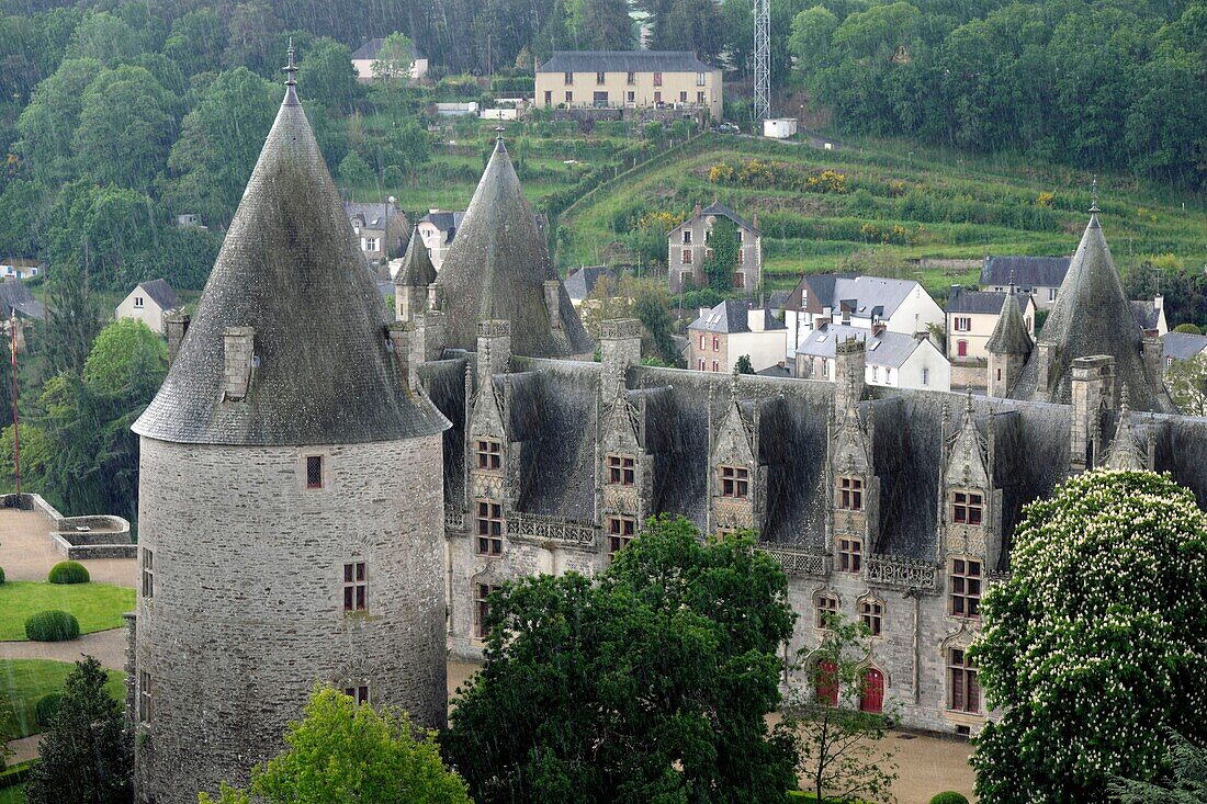 France,Morbihan,Josselin,Notre Dame du Roncier basilica,the Rohan castle in the rain seen from the bell tower